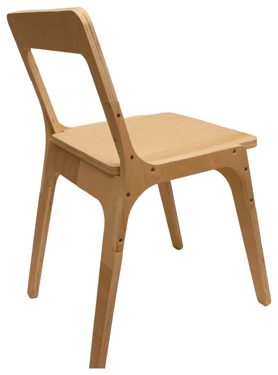 A plywood chair with an open backrest is shown from behind at an angle.