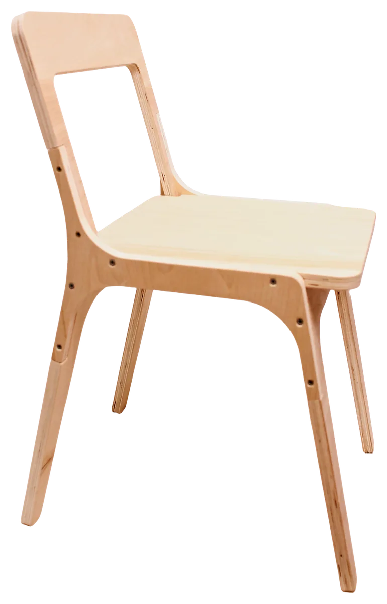 A pale plywood chair with an open backrest is shown from the front at an angle.
